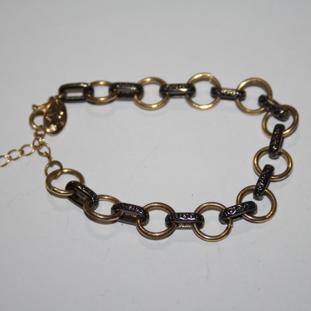 Beautiful gunmetal and gold bracelet by Charming Charlie 7-8.5"